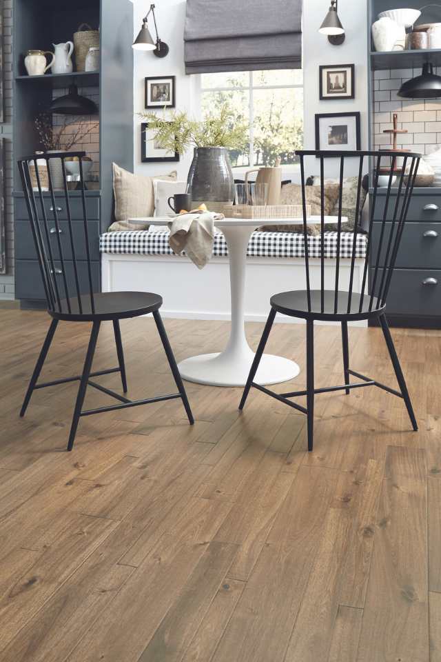 warm hardwood in farmhouse scandi style breakfast nook with greenery